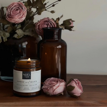 Load image into Gallery viewer, Ambre and Baies Noel &amp; Co Candle
